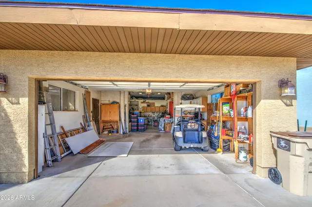 a view of a porch with wooden floor and stairs