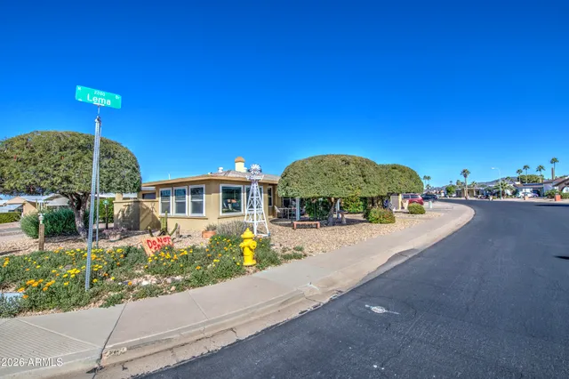 a view of a street with a house