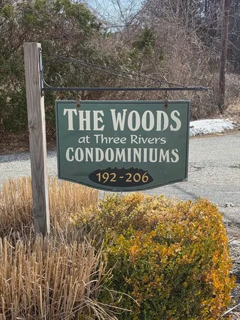 a view of outdoor space with signage and flags