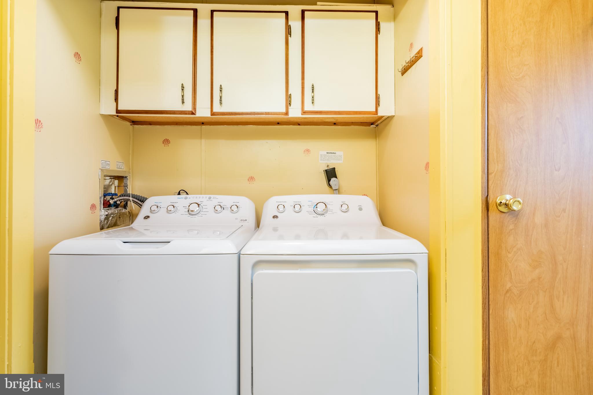 41 Pine Road Newville, PA 17241 - Photo 17 of 24 Laundry area w/storage cabinets, washer & dryer