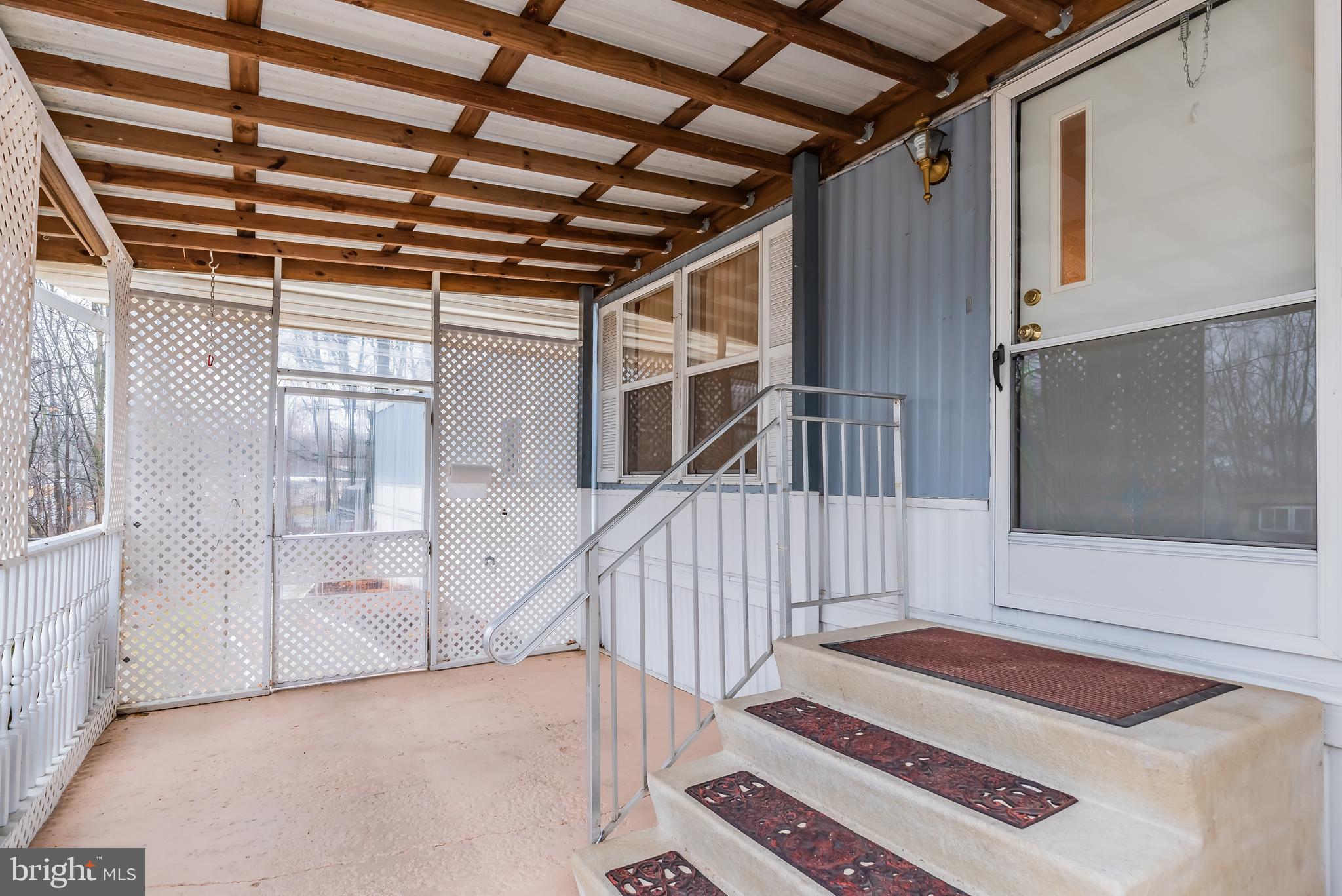 41 Pine Road Newville, PA 17241 - Photo 6 of 24 Enclosed patio and upgraded fiberglass steps