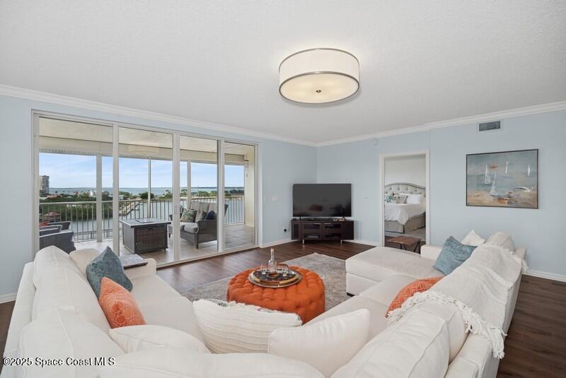 100 Riverside Drive, Unit 701 Cocoa, FL 32922 - Photo 6 of 15 04_100RiversideDrUnit701_3_FamilyRoom_Fl