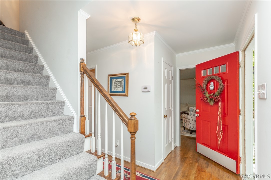 4542 Little Ridge Lane Chesterfield, VA 23832 - Photo 2 of 40 a view of entryway and hall with wooden floor