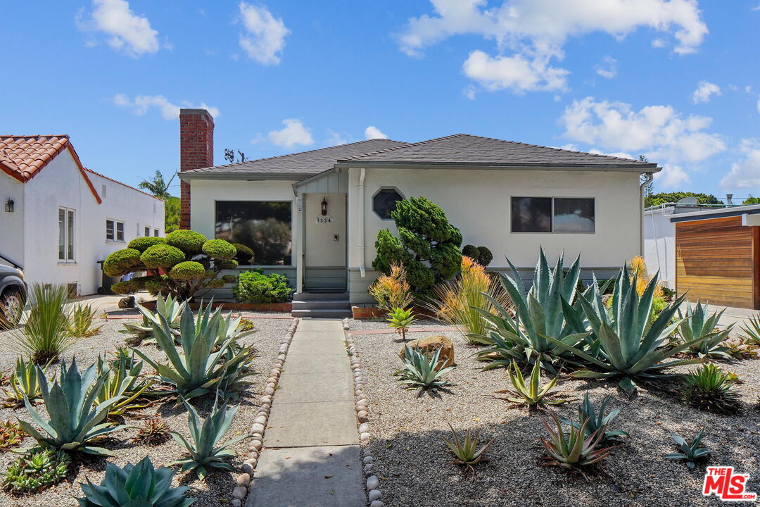 1334 Pine Street Santa Monica, CA 90405 - Photo 2 of 9 a front view of a house with garden