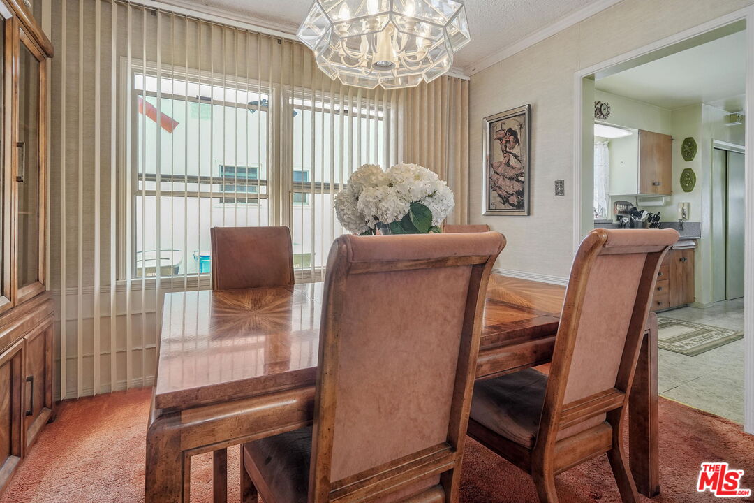 1334 Pine Street Santa Monica, CA 90405 - Photo 5 of 9 a view of a dining room with furniture window and outside view