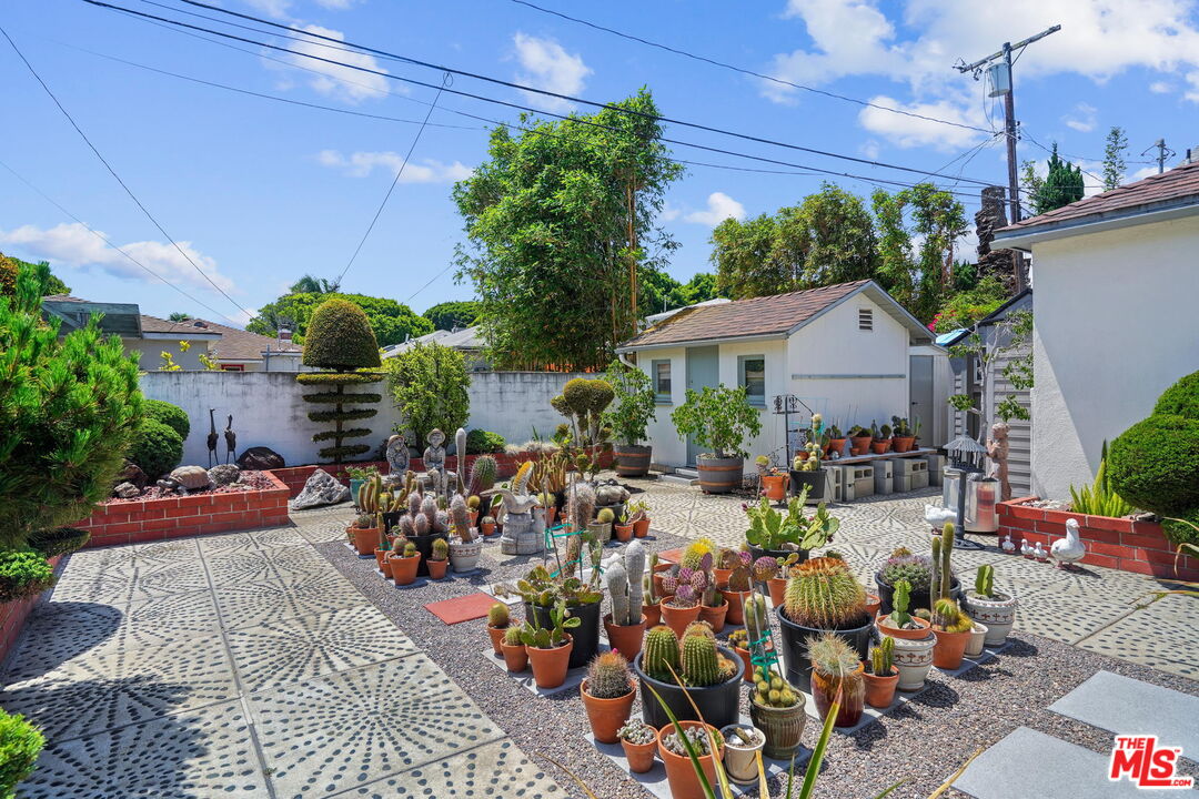 1334 Pine Street Santa Monica, CA 90405 - Photo 7 of 9 a view of a patio with table and chairs potted plants