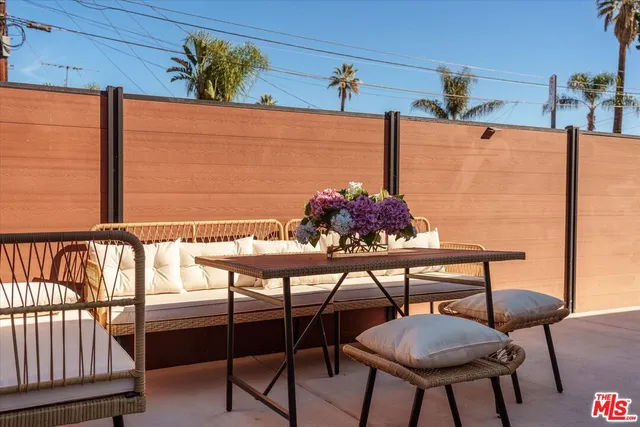 a bathroom with a sink toilet a mirror and shower