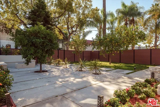 a view of a chairs and table in the patio