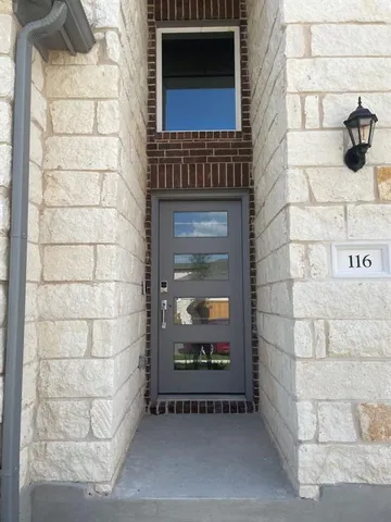 a view of a door and window