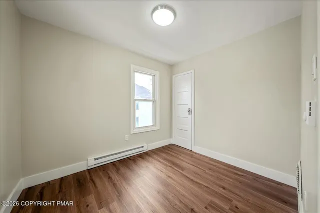 a bathroom with a sink toilet tub and shower
