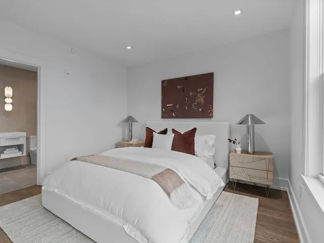 a bedroom with a bed and closet