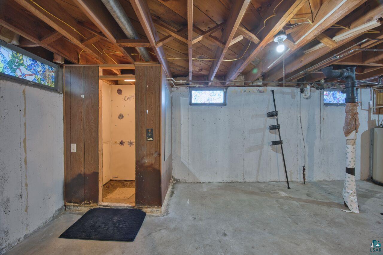 5316 Highway 110 Aurora, MN 55705 - Photo 20 of 35 Below grade area featuring water heater