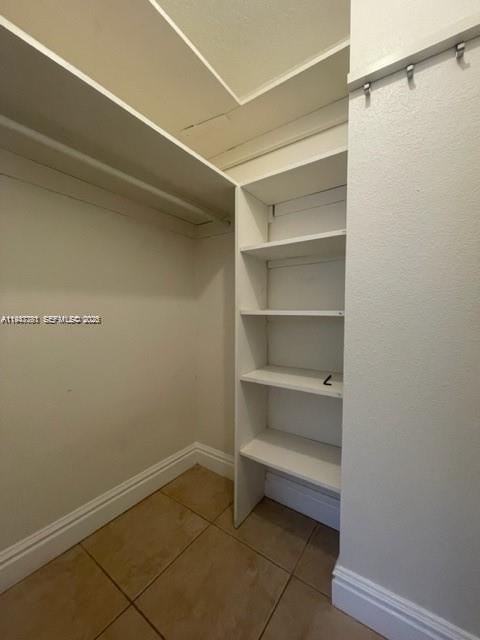 8327 Southwest 137th Avenue, Unit 8327 Miami, FL 33183 - Photo 16 of 33 closet in master bathroom