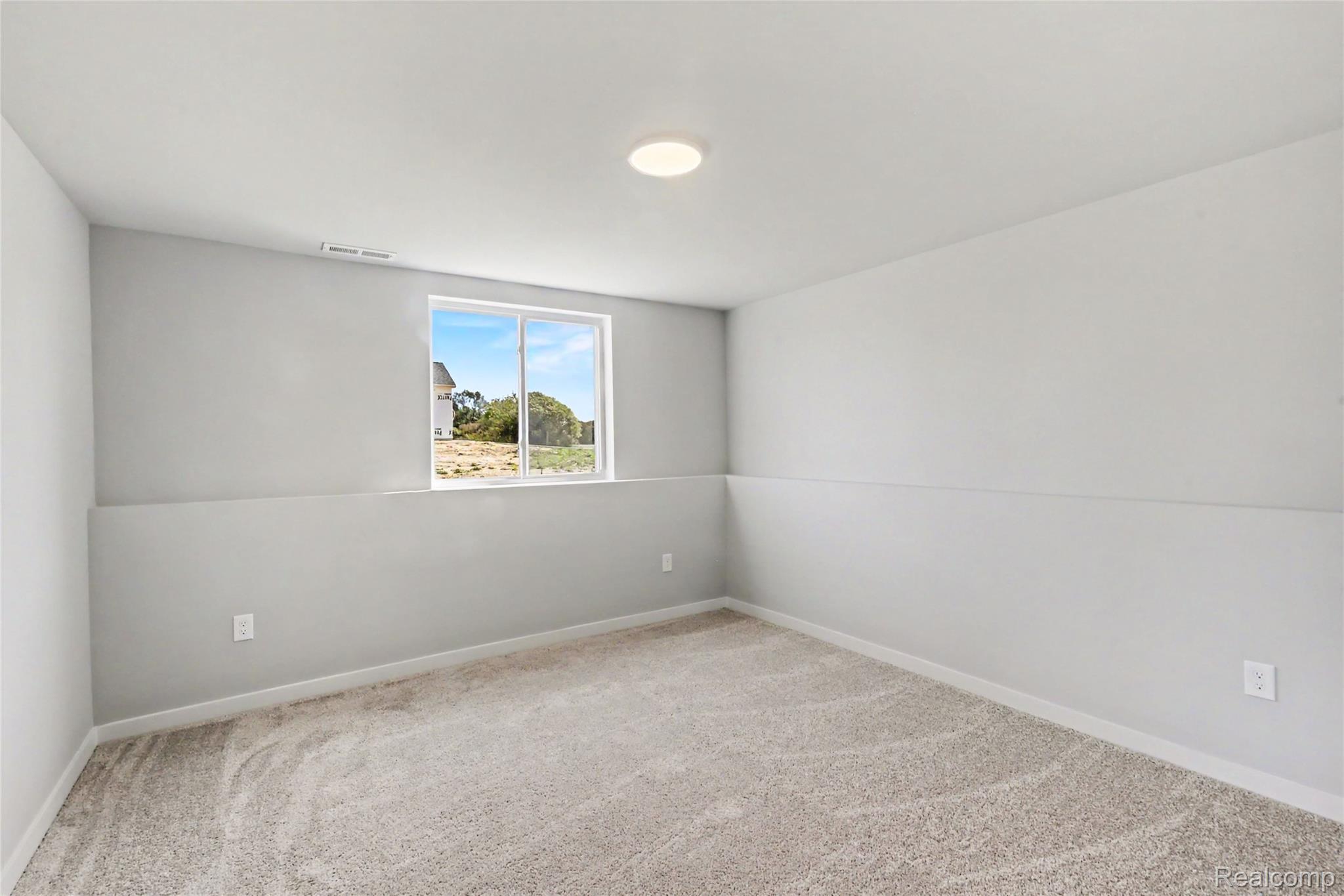 5528 Lahring Road Linden, MI 48451 - Photo 15 of 39 Lower level bedroom 3