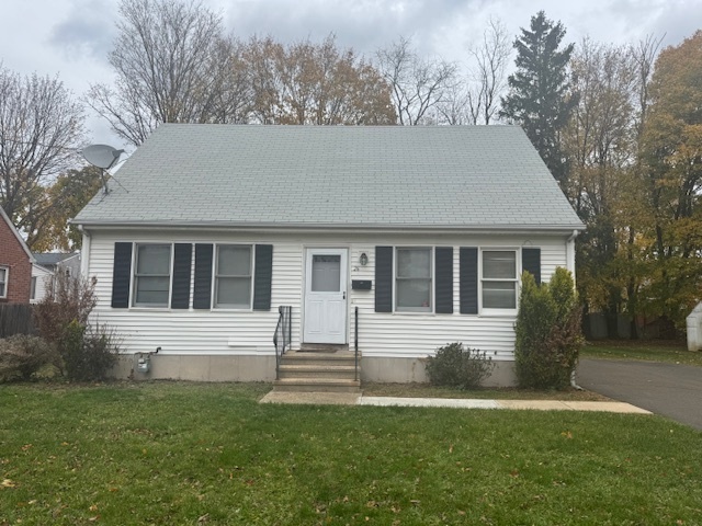 26 Albertson Road Hamden, CT 06514 - Photo 2 of 38 a front view of a house with a yard