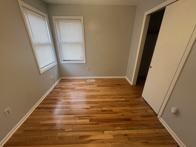 26 Albertson Road Hamden, CT 06514 - Photo 21 of 38 a view of an empty room with wooden floor and a window