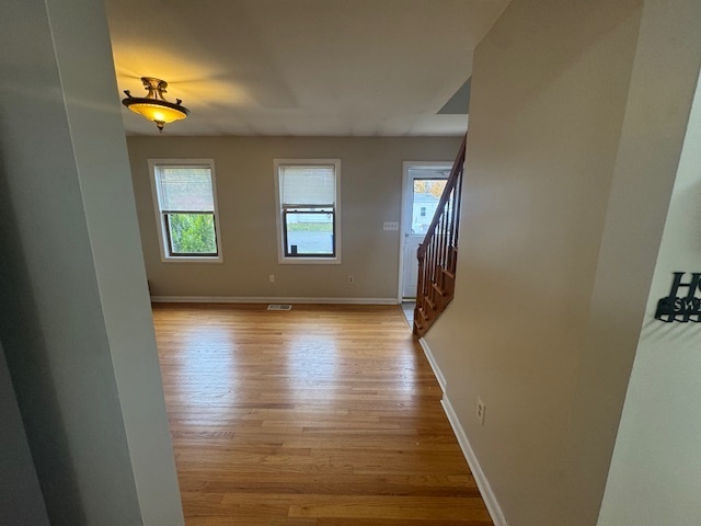 26 Albertson Road Hamden, CT 06514 - Photo 26 of 38 a view of hallway with window and wooden floor
