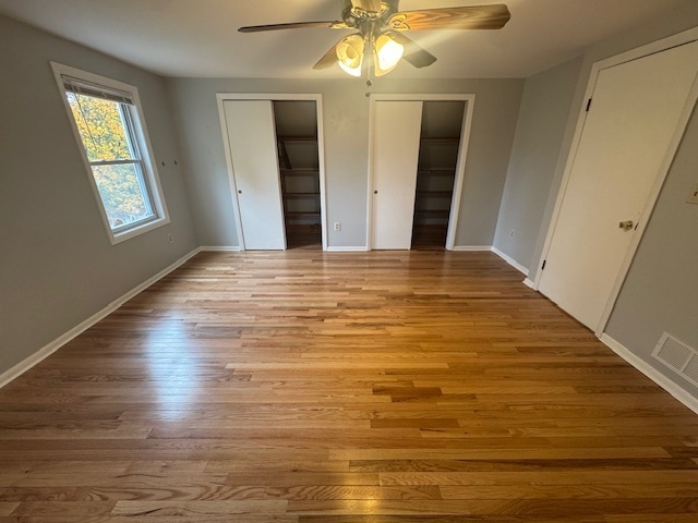 26 Albertson Road Hamden, CT 06514 - Photo 29 of 38 a view of an empty room with window and wooden floor