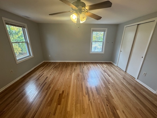 26 Albertson Road Hamden, CT 06514 - Photo 31 of 38 a view of empty room with wooden floor and fan