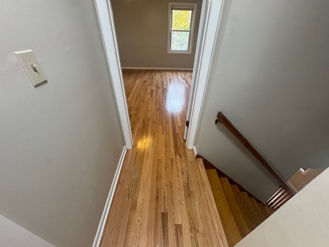 26 Albertson Road Hamden, CT 06514 - Photo 32 of 38 a view of a hallway with wooden floor and stairs