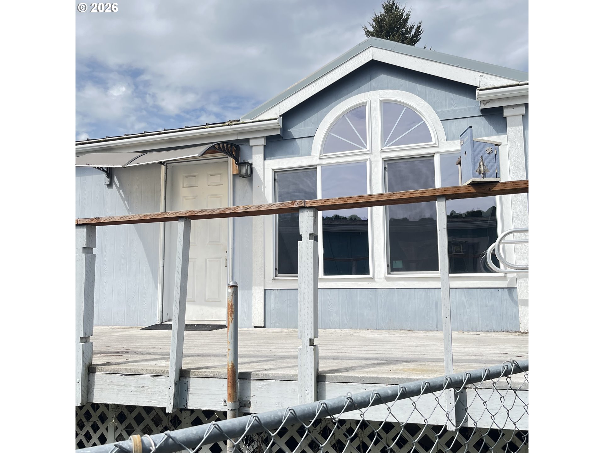 34900 Wendlandt Way, Unit F Scappoose, OR 97056 - Photo 1 of 19 a view of a house with a window