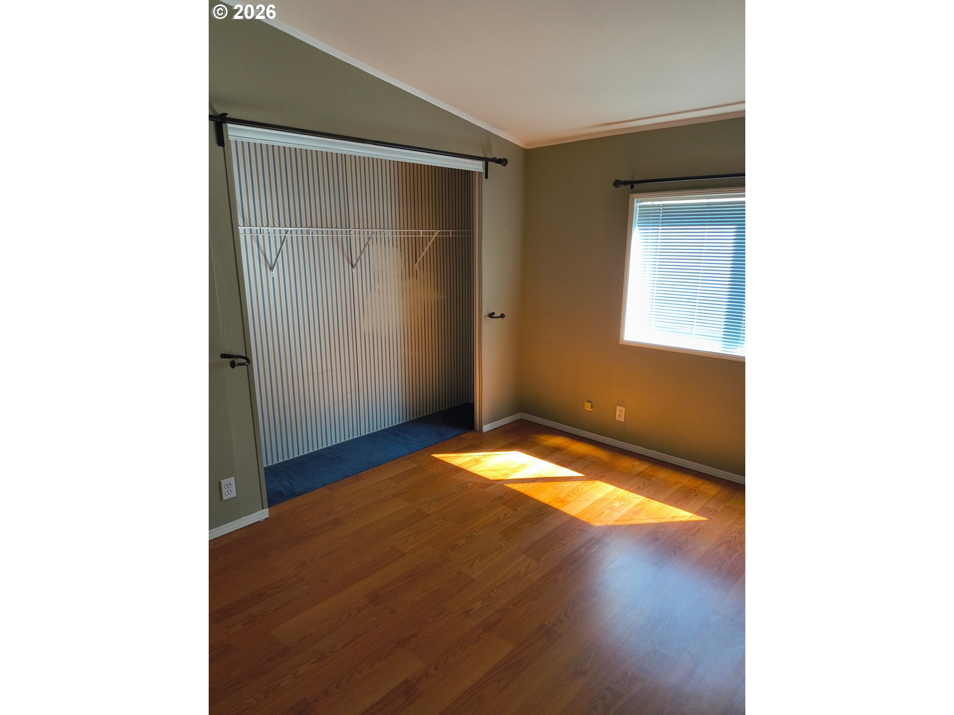 34900 Wendlandt Way, Unit F Scappoose, OR 97056 - Photo 11 of 19 a view of empty room with wooden floor