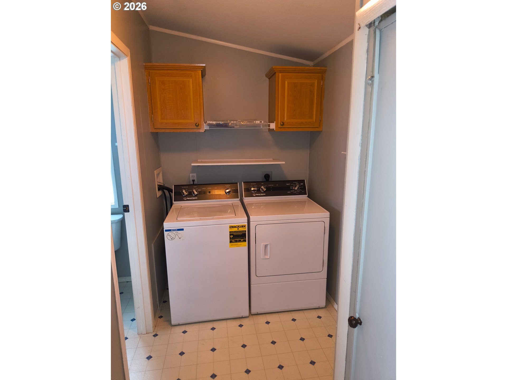 34900 Wendlandt Way, Unit F Scappoose, OR 97056 - Photo 14 of 19 a utility room with dryer and washer
