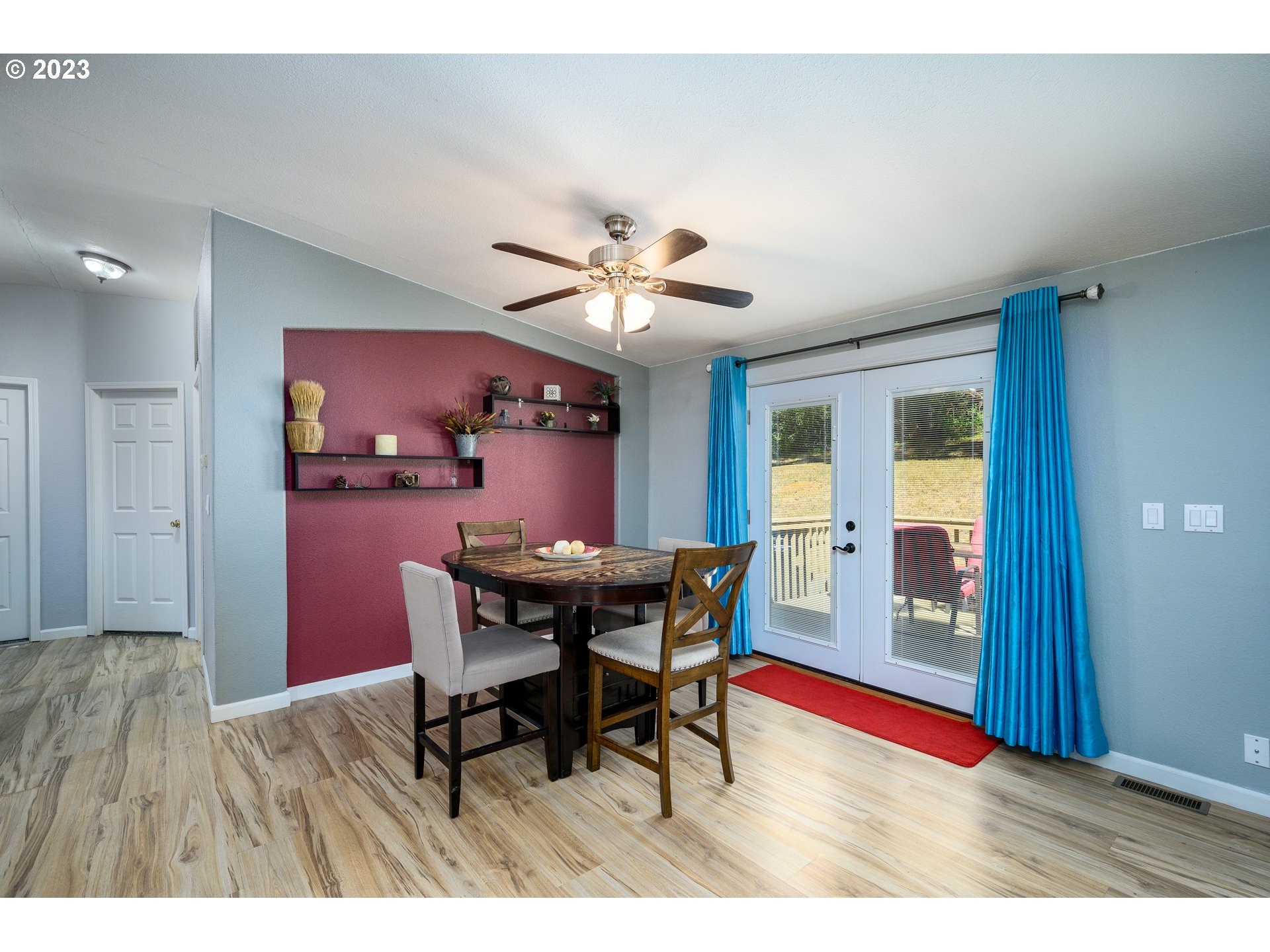 22575 Southwest Grand Ronde Road Grand Ronde, OR 97347 - Photo 20 of 46 a view of a dining room with furniture and wooden floor