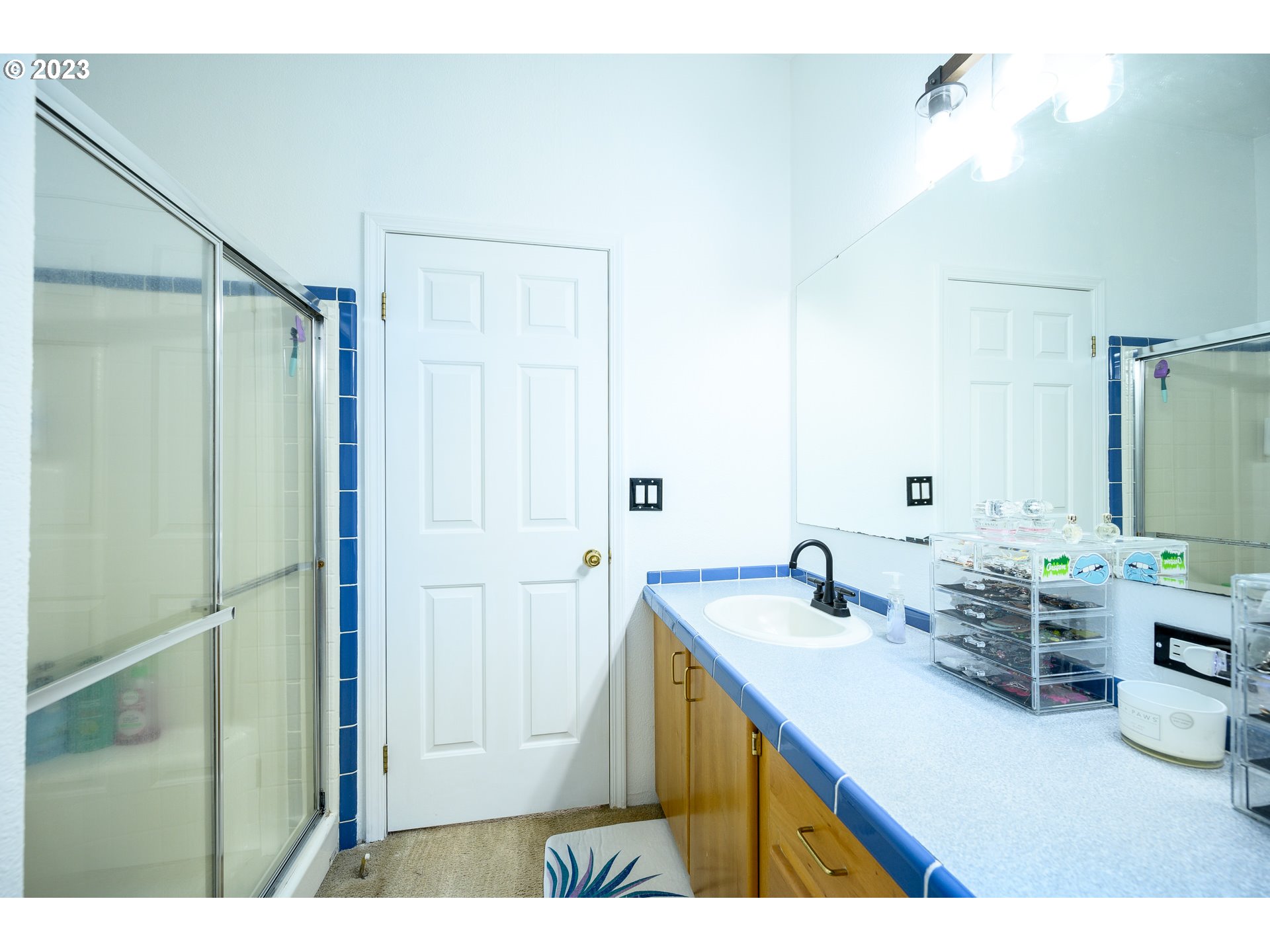 22575 Southwest Grand Ronde Road Grand Ronde, OR 97347 - Photo 28 of 46 a bathroom with a double vanity sink mirror and