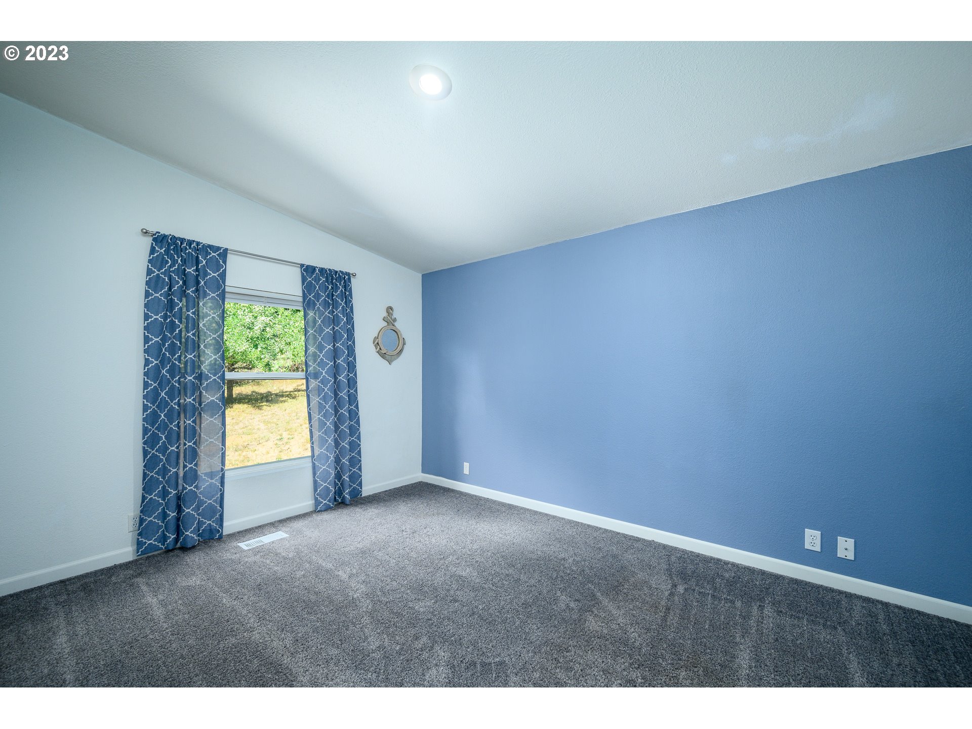 22575 Southwest Grand Ronde Road Grand Ronde, OR 97347 - Photo 29 of 46 a view of an empty room with a window