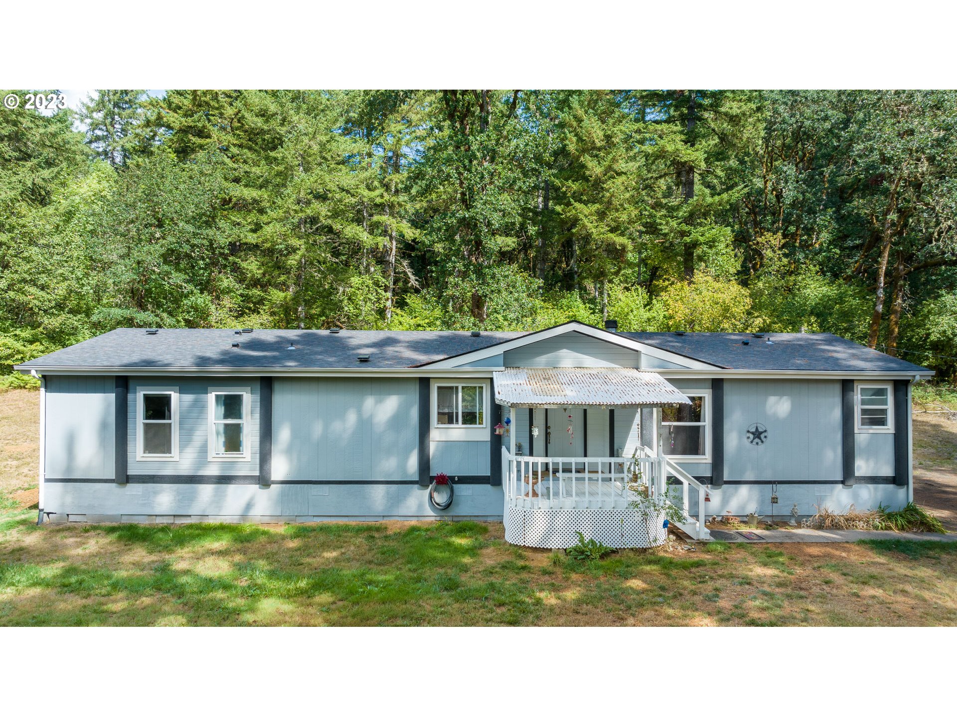22575 Southwest Grand Ronde Road Grand Ronde, OR 97347 - Photo 10 of 46 a house view with a garden space