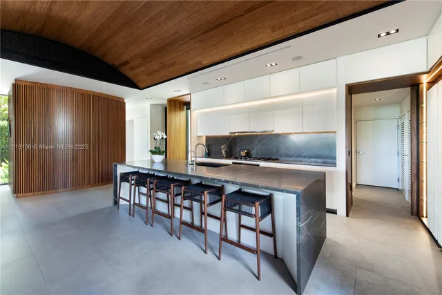 a open kitchen with stainless steel appliances granite countertop lots of counter top space