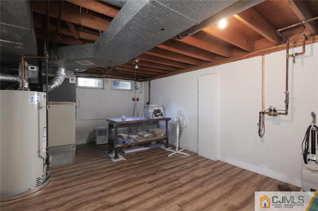 203 Normandy Road Edison, NJ 08820 - Photo 22 of 32 a view of a room with wooden floor
