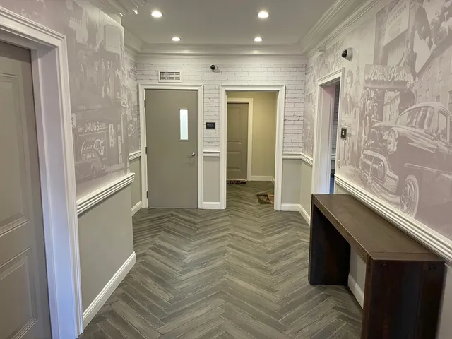 a bathroom with a sink and a shower