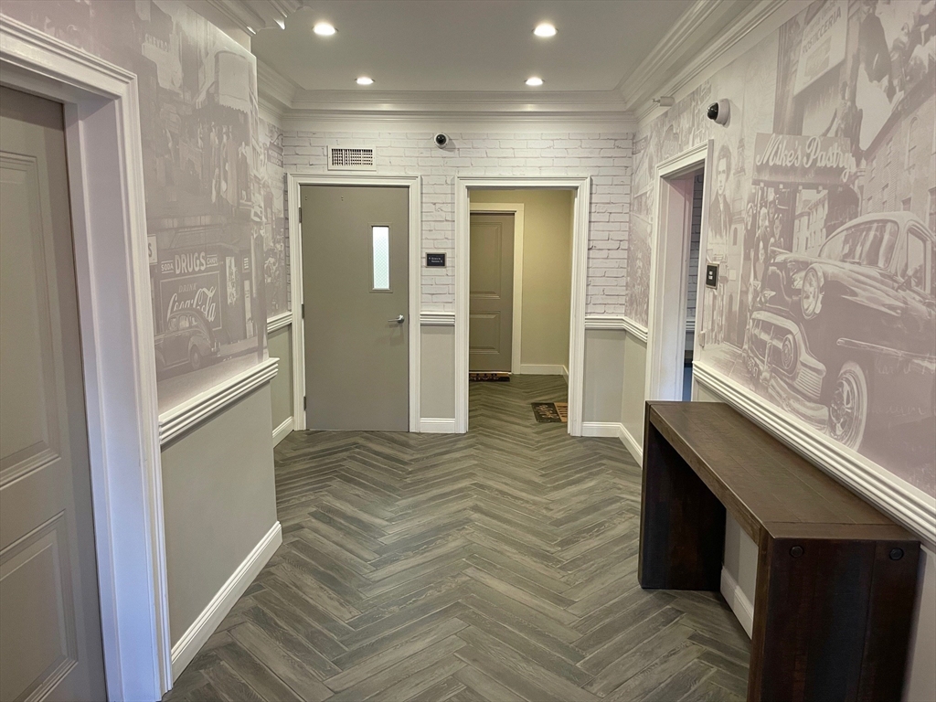20 Parmenter Street, Unit 403 Boston, MA 02113 - Photo 11 of 16 a bathroom with a sink and a shower