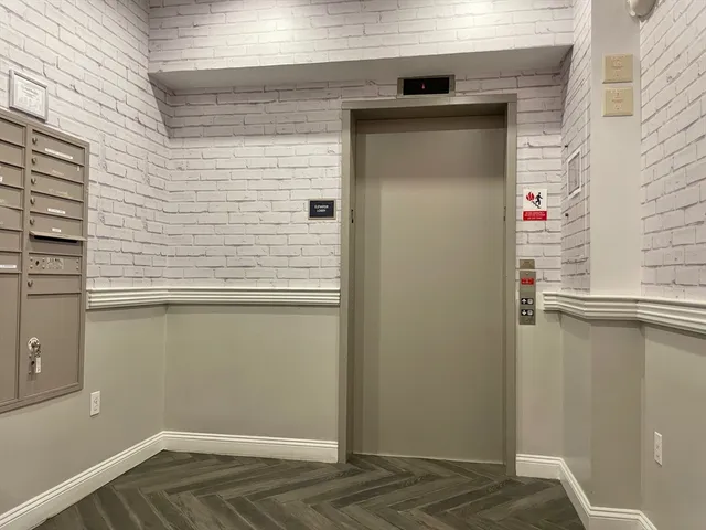 a view of a door and a window