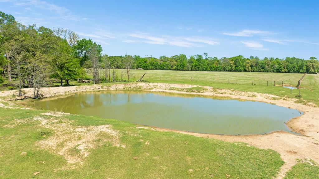 0 County Road 2356 Detroit, TX 75436 - Photo 8 of 27 a view of a lake with houses in the back