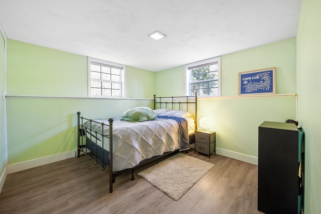 164 Turkey Hill Road Rutland, MA 01543 - Photo 17 of 30 a bedroom with a bed and wooden floor
