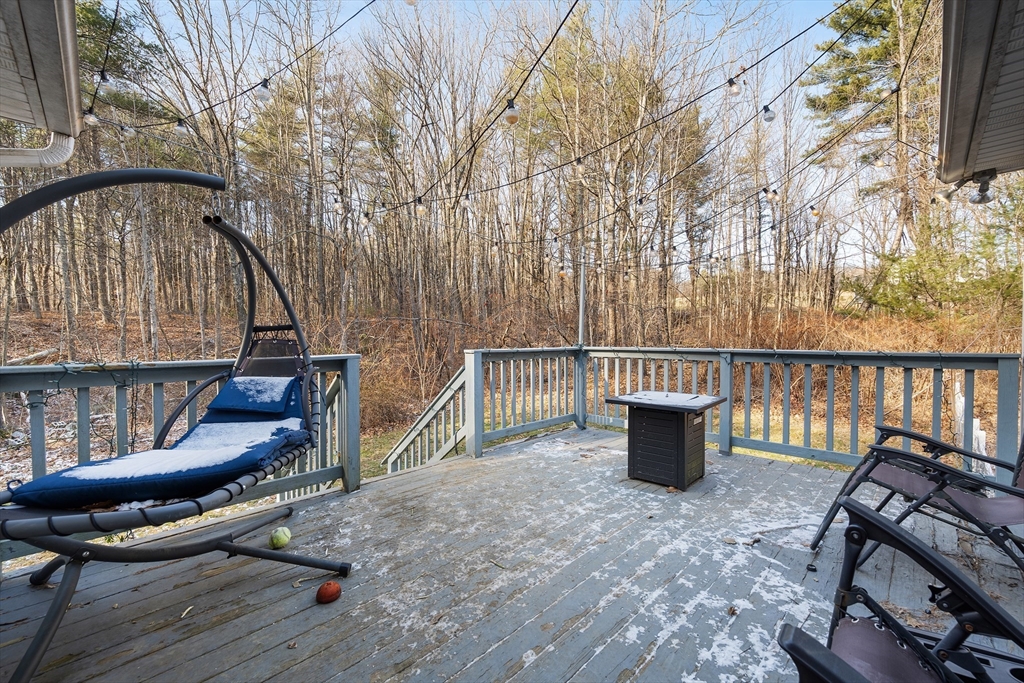 164 Turkey Hill Road Rutland, MA 01543 - Photo 23 of 30 a view of a chairs in wooden deck