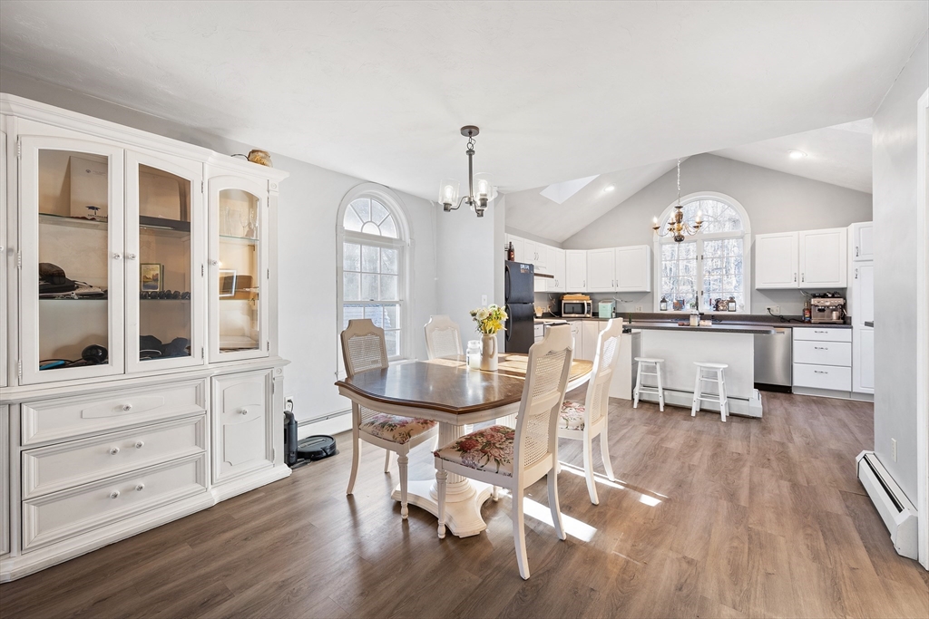 164 Turkey Hill Road Rutland, MA 01543 - Photo 4 of 30 a view of a dining room with furniture window and wooden floor