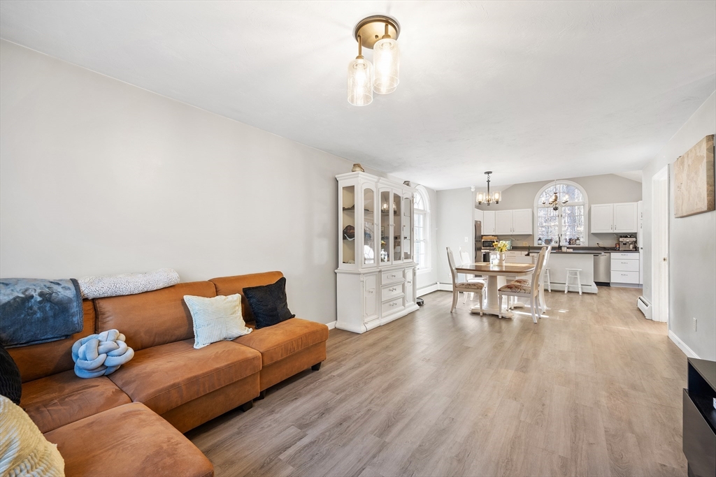 164 Turkey Hill Road Rutland, MA 01543 - Photo 6 of 30 a living room with furniture and wooden floor