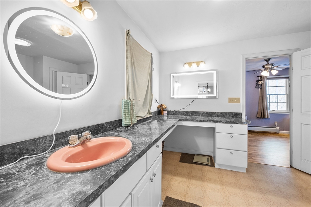 164 Turkey Hill Road Rutland, MA 01543 - Photo 10 of 30 a bathroom with a granite countertop sink and a mirror