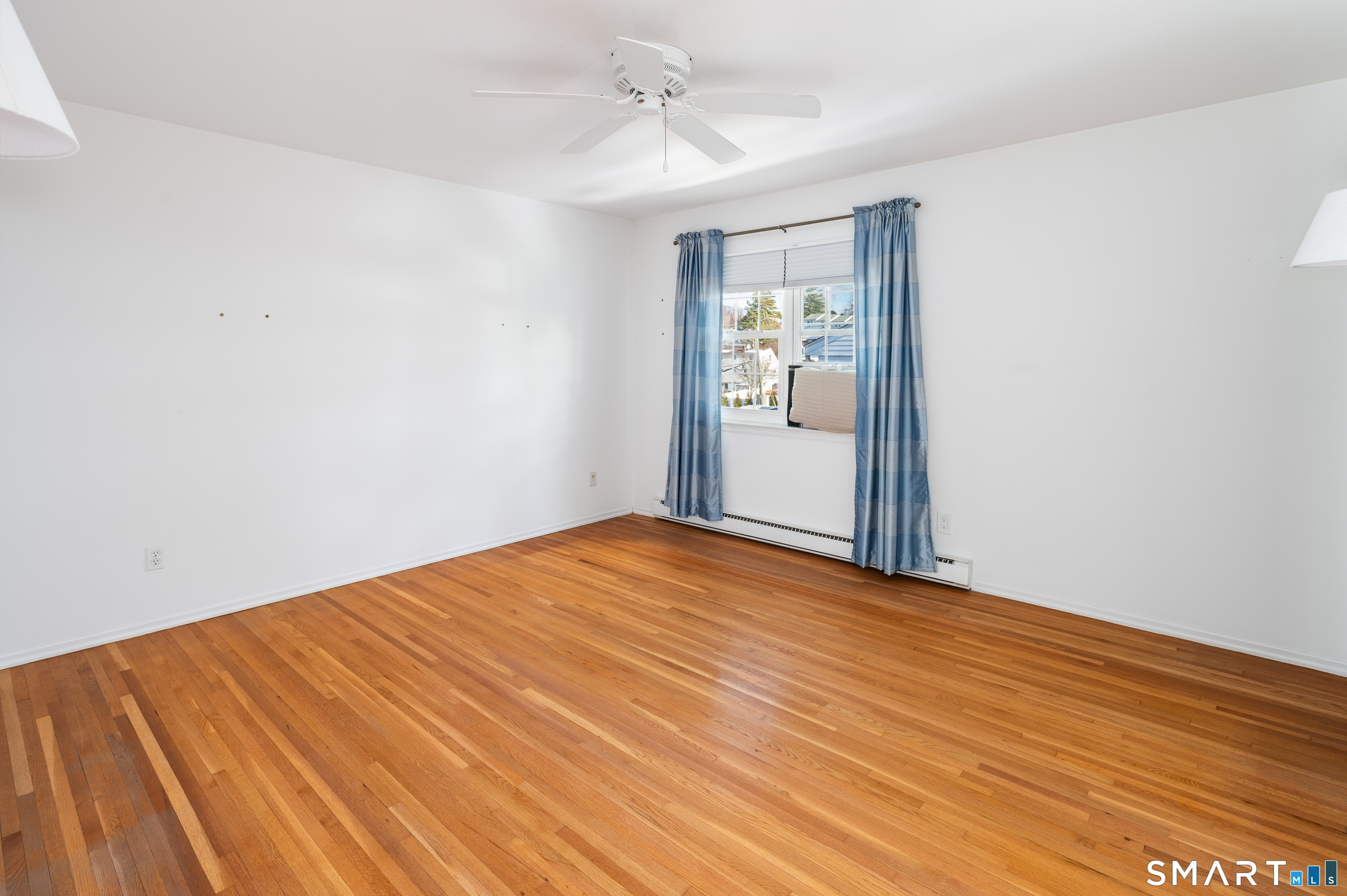 240 Wardwell Street, Unit 26 Stamford, CT 06902 - Photo 19 of 28 wooden floor in an empty room