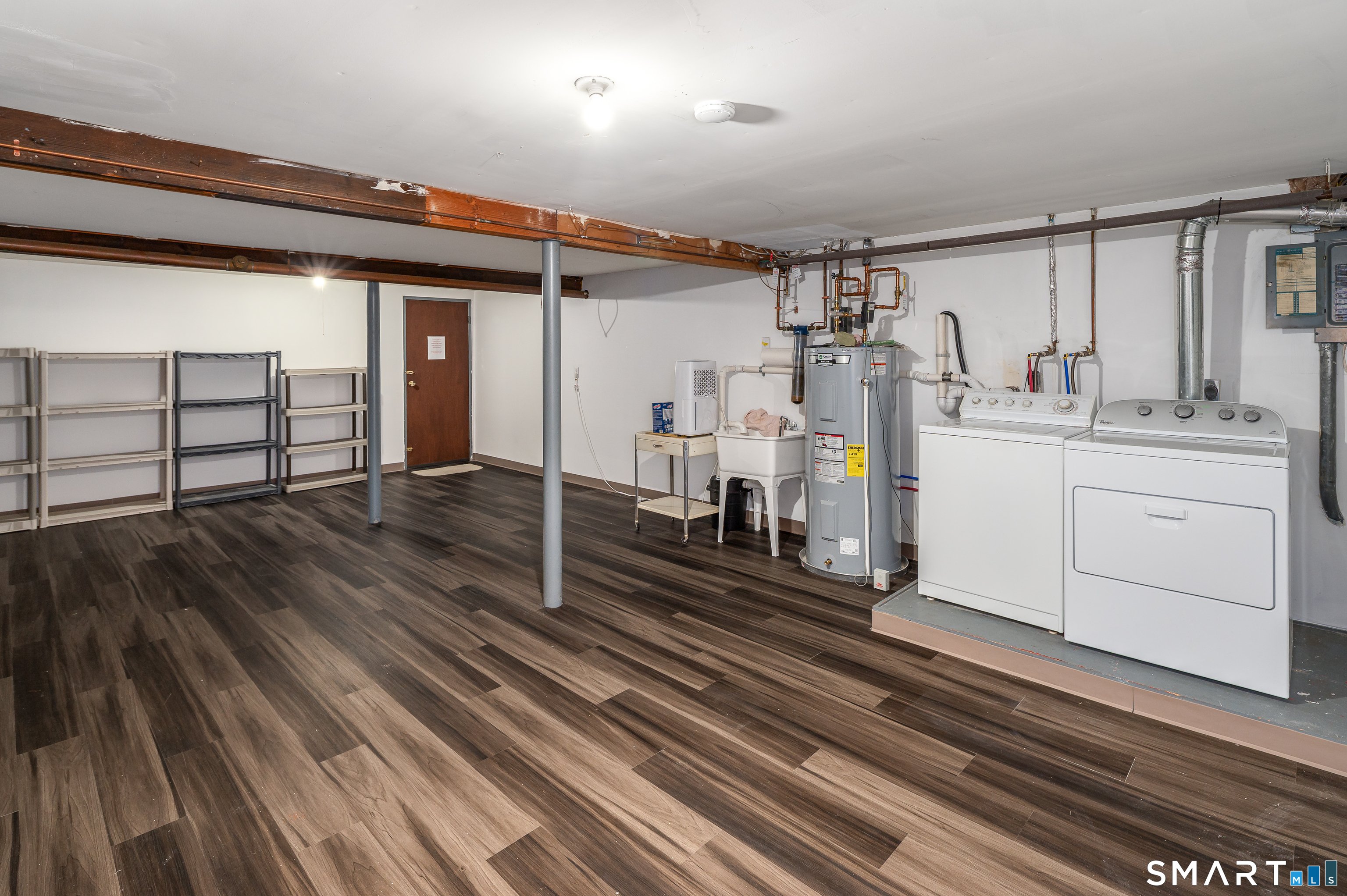 240 Wardwell Street, Unit 26 Stamford, CT 06902 - Photo 21 of 28 a very nice looking room with wooden floor