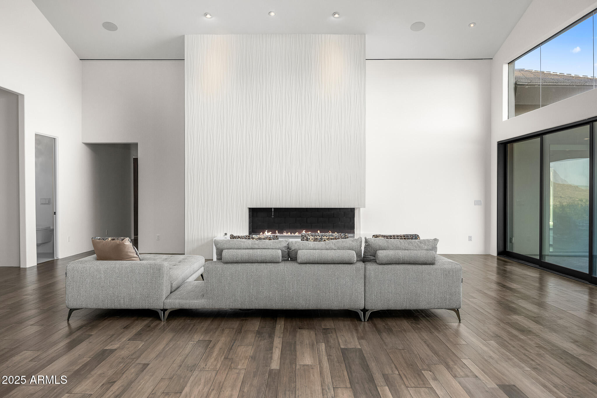 4129 East Sandy Mountain Road Paradise Valley, AZ 85253 - Photo 19 of 76 a living room with furniture and a wooden floor