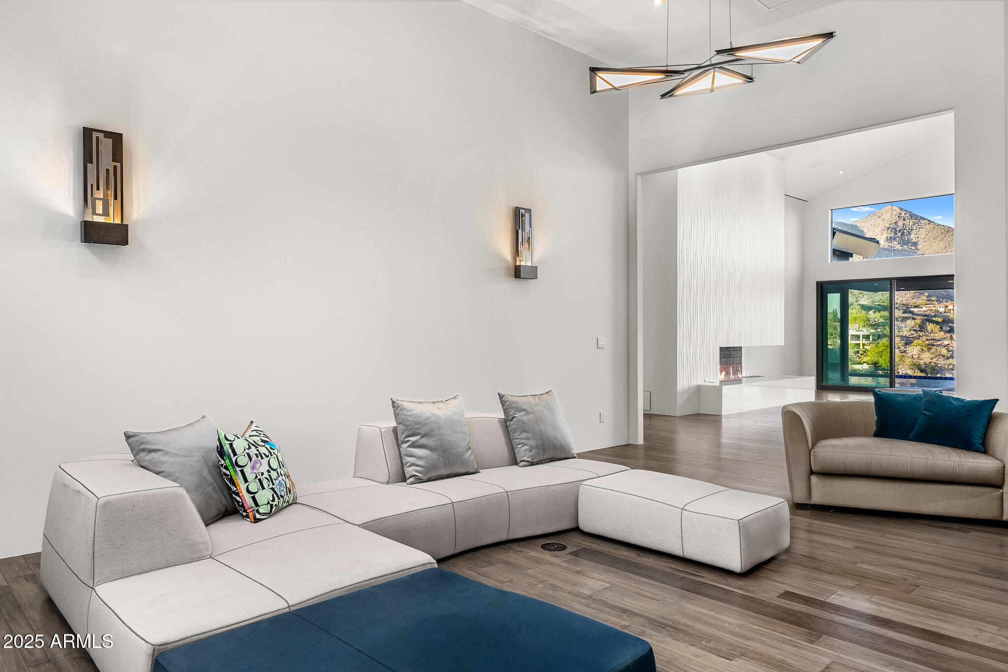 4129 East Sandy Mountain Road Paradise Valley, AZ 85253 - Photo 23 of 76 a living room with furniture and a wooden floor