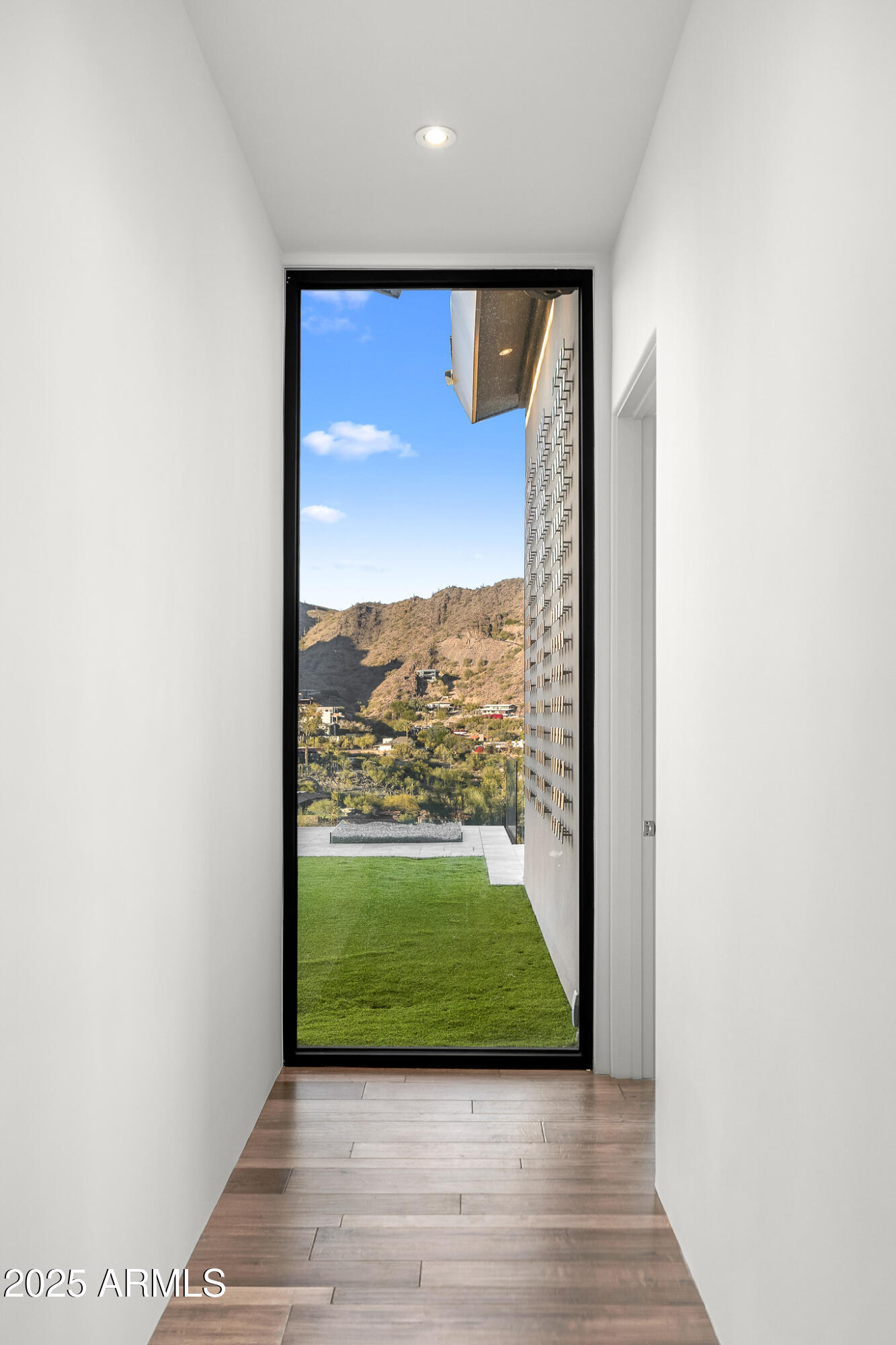 4129 East Sandy Mountain Road Paradise Valley, AZ 85253 - Photo 25 of 76 a view of a living room from a hallway