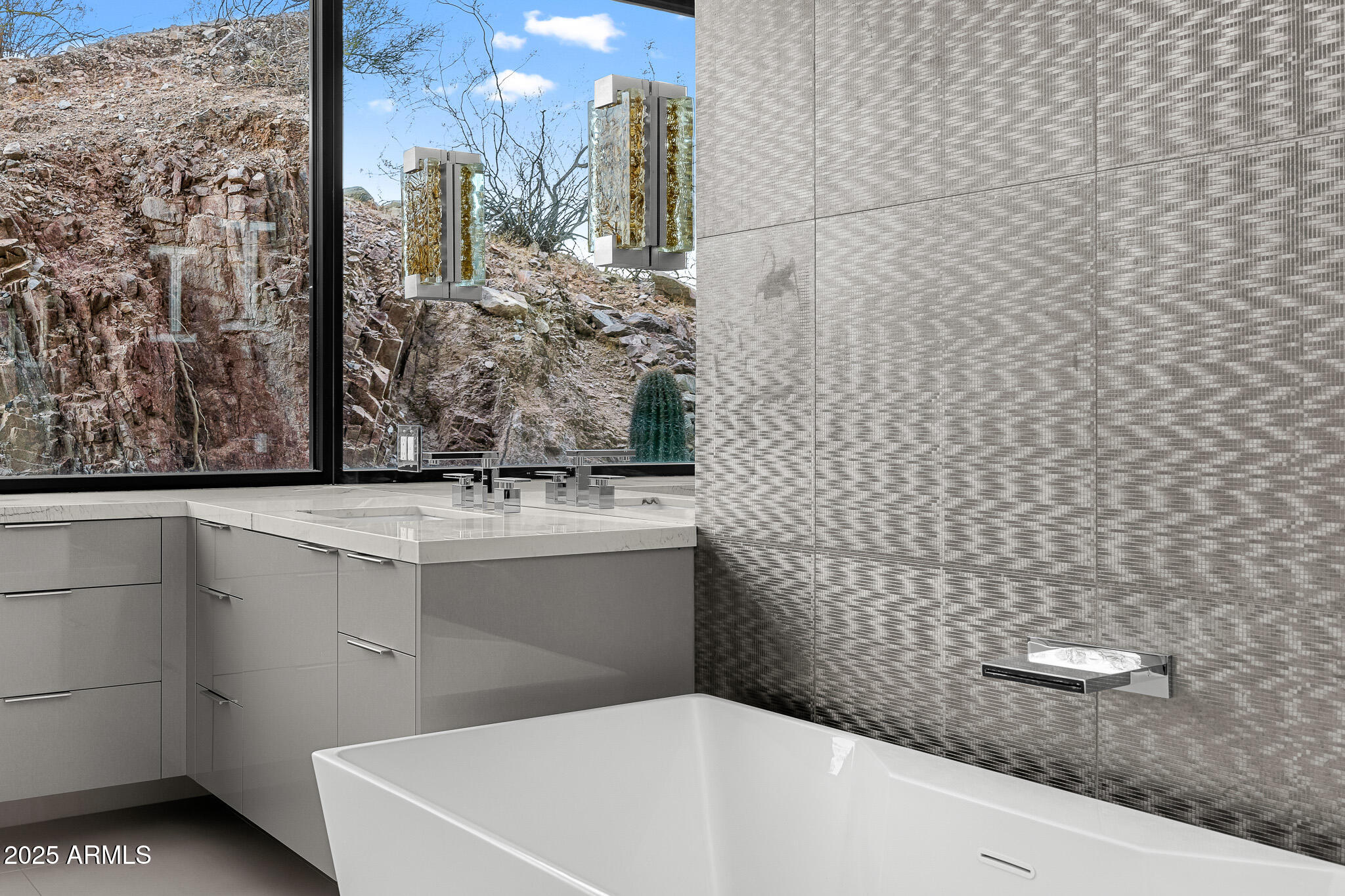 4129 East Sandy Mountain Road Paradise Valley, AZ 85253 - Photo 36 of 76 a bathroom with a granite countertop sink and a mirror