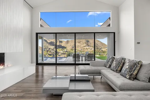 a view of a living room and bathroom