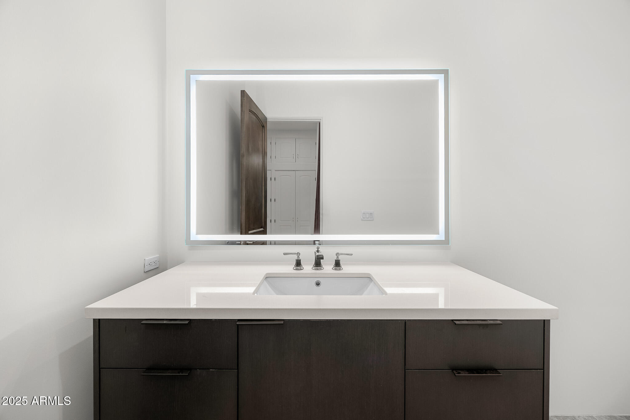 4129 East Sandy Mountain Road Paradise Valley, AZ 85253 - Photo 47 of 76 a bathroom with a sink and a mirror